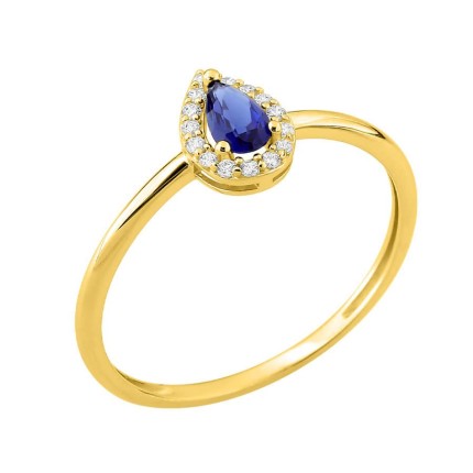 Anillo bañado en oro con circonita blanca, incluyendo una piedra azul en forma de pera de 5x3 mm