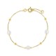 Pulsera de oro amarillo de 9K con cadena tipo curb y tres perlas cultivadas de agua dulce de 6 x 4 mm