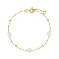 Pulsera de oro amarillo de 9K con cadena tipo curb y tres perlas cultivadas de agua dulce de 6 x 4 mm