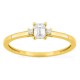 Anillo solitario de oro amarillo 9K con diamante de talla esmeralda acompañado 0,27 ct