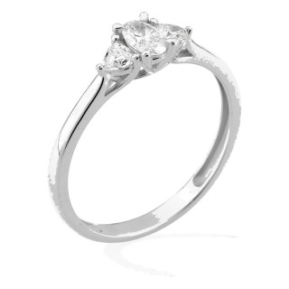 Anillo de oro blanco 9K con diamante ovalado 0,20 ct y dos piedras triangulares