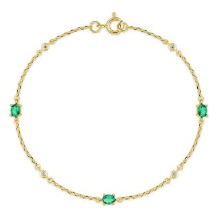 Pulsera flexible chapada en oro con circonitas verdes en engaste de garras