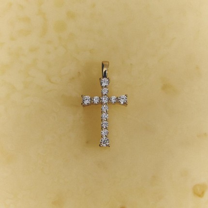 Colgante de cruz en oro amarillo de 9K y circonitas