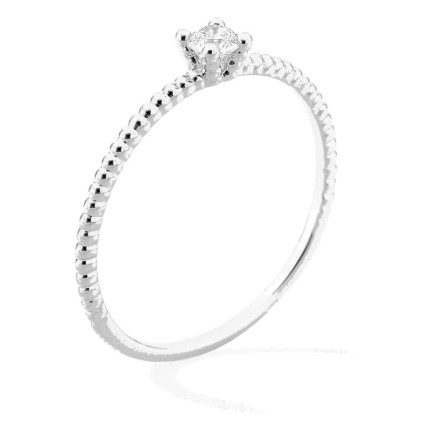 Anillo solitario de oro blanco 18K con aro perlado y diamante 0,10 ct