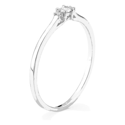 Anillo solitario de oro blanco 9K con diamante acompañado 0,06 ct