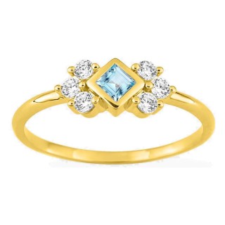 Anillo chapado en oro con circonita azul cielo talla princesa y circonitas blancas
