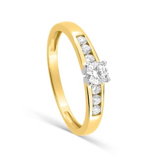 Anillo solitario acompañado de oro amarillo 18K, rodio y circonitas