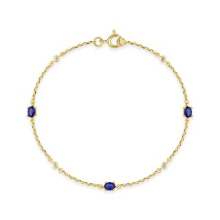 Pulsera chapada en oro con circonitas azules y blancas