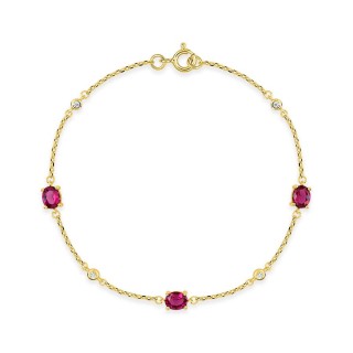 Pulsera chapada en oro con circonitas rojas en garras y circonitas blancas en engaste cerrado